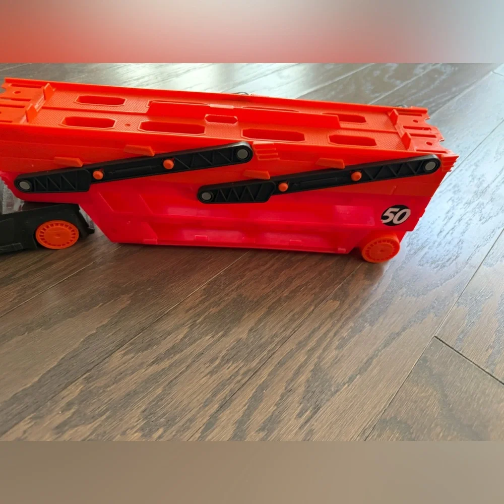 Hot Wheels Mega Hauler Truck (2015) holds 50 cars - NEW in box